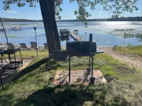Escape to a Beautiful 4-Bedroom 2-Bath Waterfront Log Home in Danbury, Wisconsin