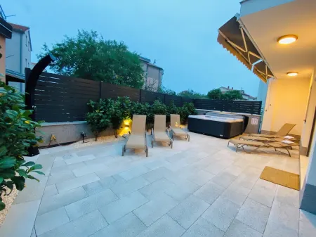 Mala Perla - stylish vacation home with whirlpool, barbecue & close to the beach!