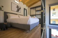 Open space on two floors in detached cottage in ancient medieval courtyard