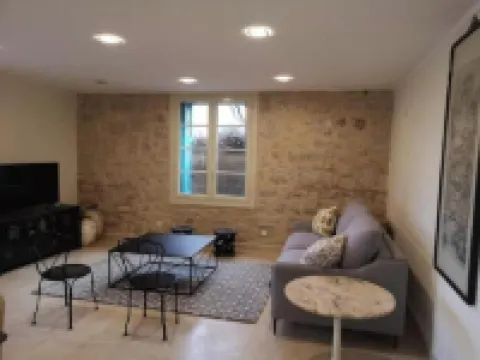 Large apartment in villa with garden and pool