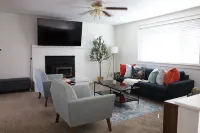 Two kitchens, patio, fenced backyard, and playground.