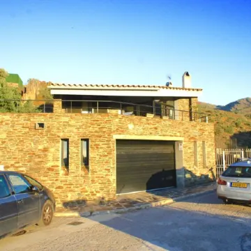 A charming family home with private pool in Cadaques with sea views.