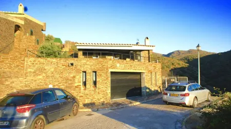 A charming family home with private pool in Cadaques with sea views.