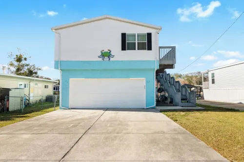 Waterfront: Jacuzzi, SUP, Kayaks, Big H2O Mat, Fun Room, Ping Pong, Dock & Canoe