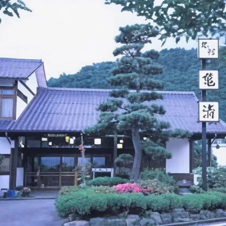 Kamesei Ryokan Отели в г. Тикума