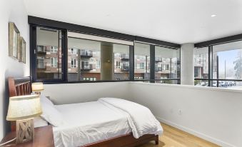 Airy and Open Corner Loft - 92 Walkscore