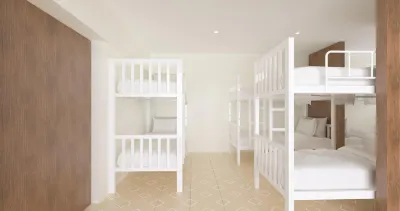 Voyagers Hostel 로 달람 베이 호텔