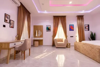 Rhema Apartments Отели в г. 