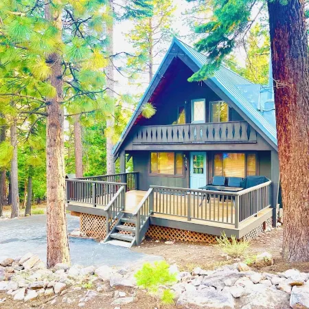 Modern A-Frame cabin that is a nice stroll down to the lake.
