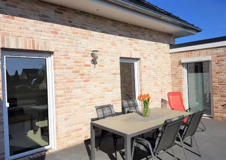 Exclusive vacation apartment in a quiet, central location in Rhauderfehn! Отели в г. Раудерфен