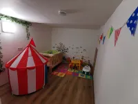 5 sleeps with kids play area and travel cot