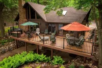 Whitefish Chain Lake Home with Beach + Sauna + King Beds + Kayaks +Paddle Boards