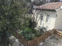 Small flowered house with private garden near town center