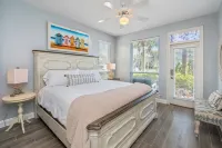 "Seaside Bliss: Waterfront Villa Just Steps from the Beach"