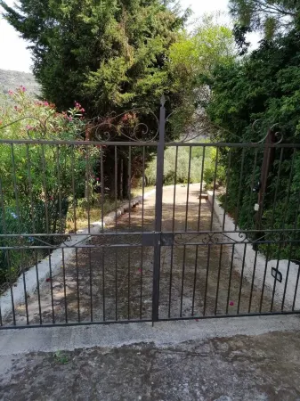 Typical Aeolian house surrounded by Mediterranean nature