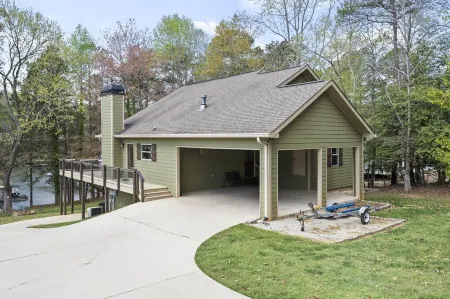 Waterfront with an easy walk to party dock and pet friendly home on Lake Lanier