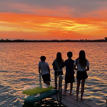 Spacious 4 bedroom lakefront house: with private dock and pool.