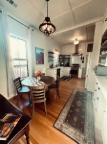 Walk only two blocks to downtown with private backyard space! Pet-Friendly!