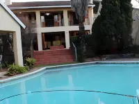 2 Leafed Doors Hotels in Bryanston