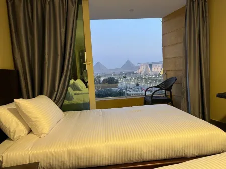 Asia Grand Museum & Pyramids View Отели в г. Kerdasah