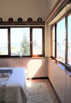Salty Jackal Surf Camp Hotel di Langstrand
