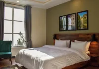 The Point by Roomy, Thandiani Hotel dekat Awan Shopping Plaza Phase 2