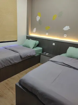 Omber Inn Hotel dekat Taman Gaia Bumi Raya City Mall