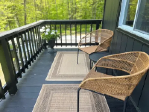 Pet-Friendly Winter Retreat in the Woods with Fireplace Near Okemo + Killington