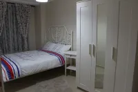 Kinzi House