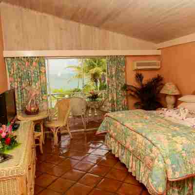 Coco Reef Resort & Spa Rooms