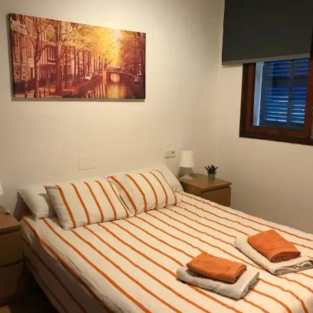 Accommodation on harbor and beach with mountain views