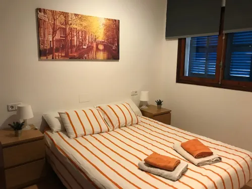 Accommodation on harbor and beach with mountain views