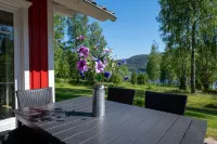 Comfortable Swedish house in a prime location on Lake Rottnan with its own shoreline Hotels in Sunne