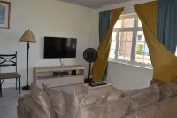 2-bedroom Gated Oasis with parking andPool