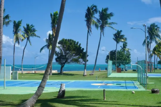 Private Island 1BR Condo with Oceanview, Pool View, 500MB WiFi & A/C