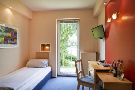 Hotel am Mühlenteich Отели в г. Любек