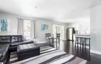 Torch Lake 4 bedroom home w/ large yard & parking