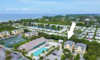 Private townhome steps from the beach and right next to the pool