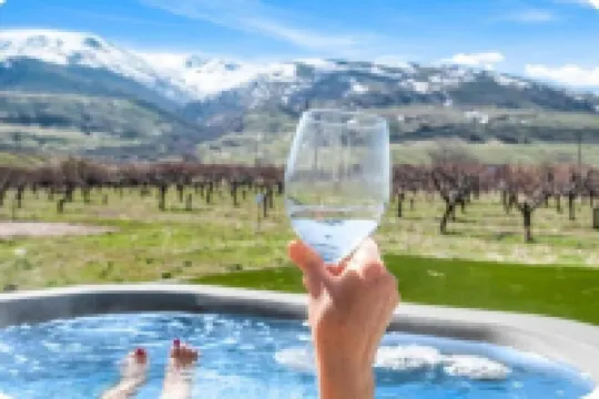 Entire Home Sleeps 16, Near Ski Resorts, Private Hot Tub, and Fireplace over Tub