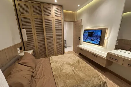 Premium Apartments with Private Garden and Outdoor Lounge Отели в г. Qesm Boulaq Ad Dakrour