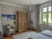 Landhaus hinter'm See vacation apartment Landliebe luxurious winter garden tiled stoves Uecker-Randow 호텔