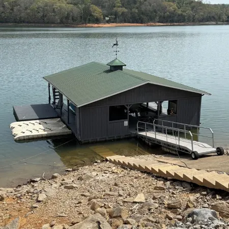 East Norris Point Breathtaking Lake View with Private Dock in Year Around Water