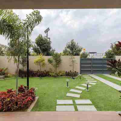 Bloom Haven by Stayjade Poolgarden1h HSR E-city Hotel Exterior