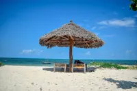 Blue Earth Beach Bungalow - Strand