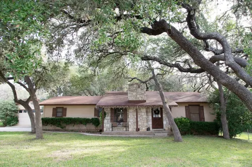 The house is in the middle of town, next to HEB with an amazing backyard.