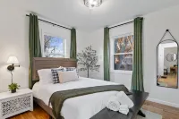Urban Oasis: A Charming Downtown Retreat with Game Room, Firepit and Yard Games - 4-Star