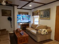 Comfy cabin in the woods with huge party deck