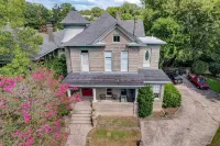 Victorian home with four bedrooms and four and one half bathrooms.