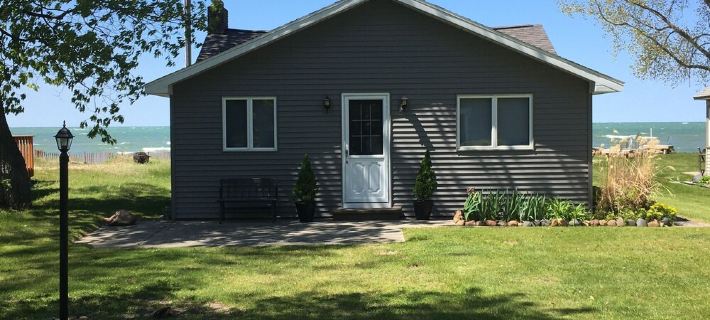 Charming and Cozy Lake Front Cottage on Private Beach Hotels in Huron County