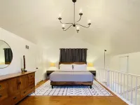 Experience History in an original Carriage House located behind a Colonial home.